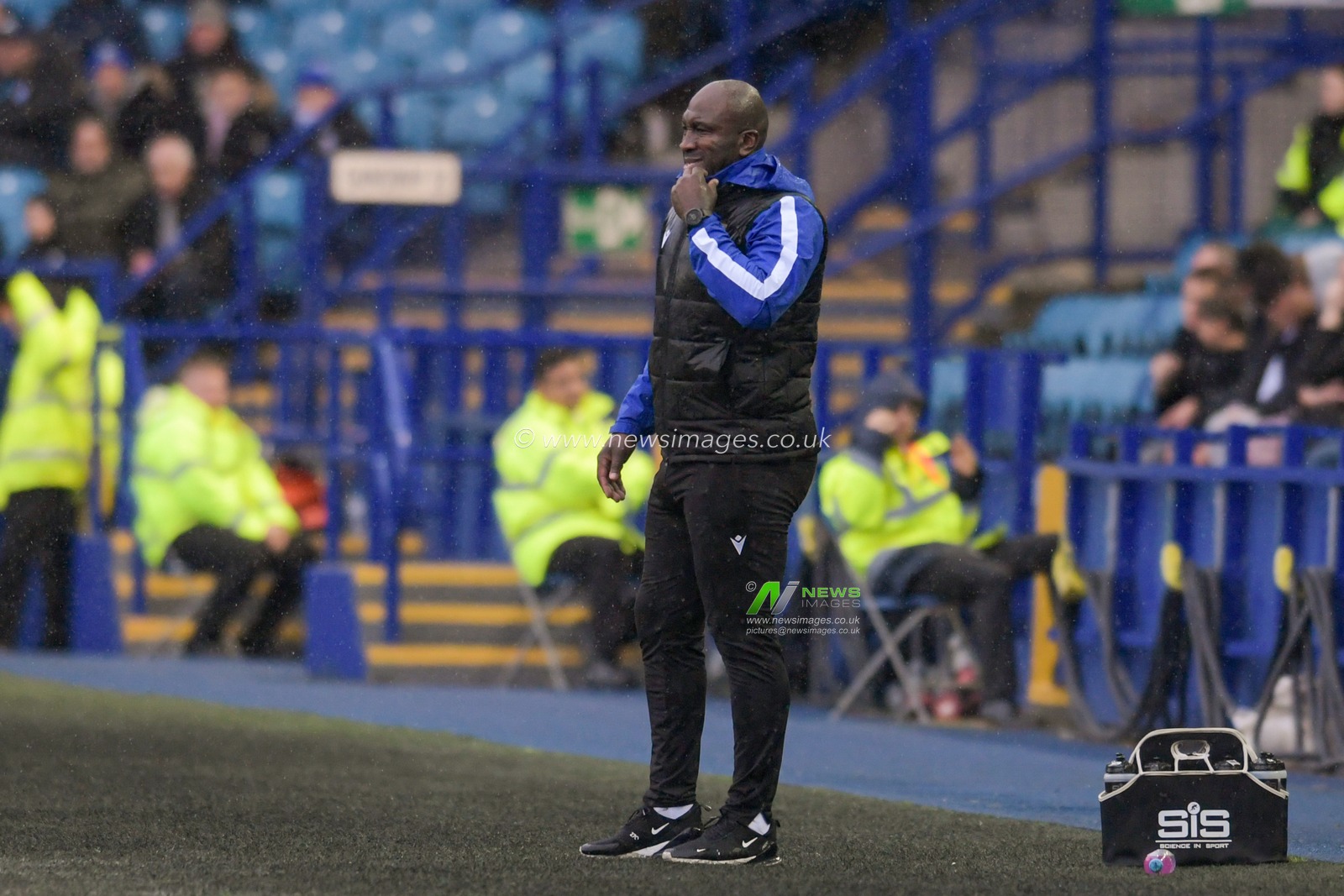 Darren Moore manager of Sheffield Wednesday watches the game from the technical area
