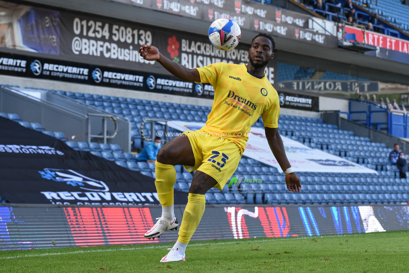 Fred Onyedinma (23) of Wycombe Wanderers attempts to control the ball