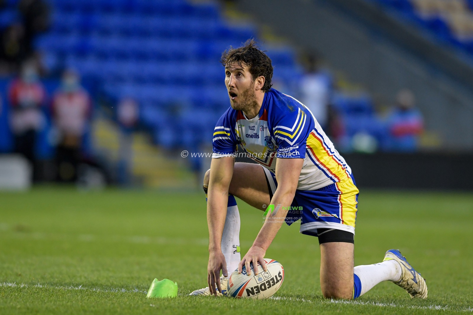 Stefan Ratchford (1) of Warrington Wolves prepares to kick a conversion