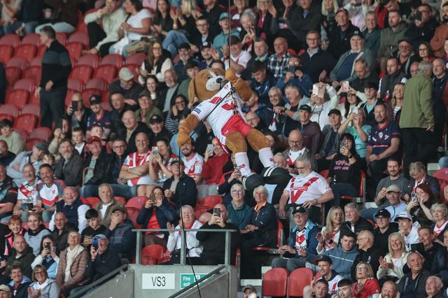 St Helens mascot Boots abseils off the roof with help of the Royal Marines to deliver the match ball during the Betfred Super League Round 25 match St Helens vs Wigan Warriors at Totally Wicked Stadium, St Helens, United Kingdom, 5th September 2025

(Photo by Mark Cosgrove/News Images)