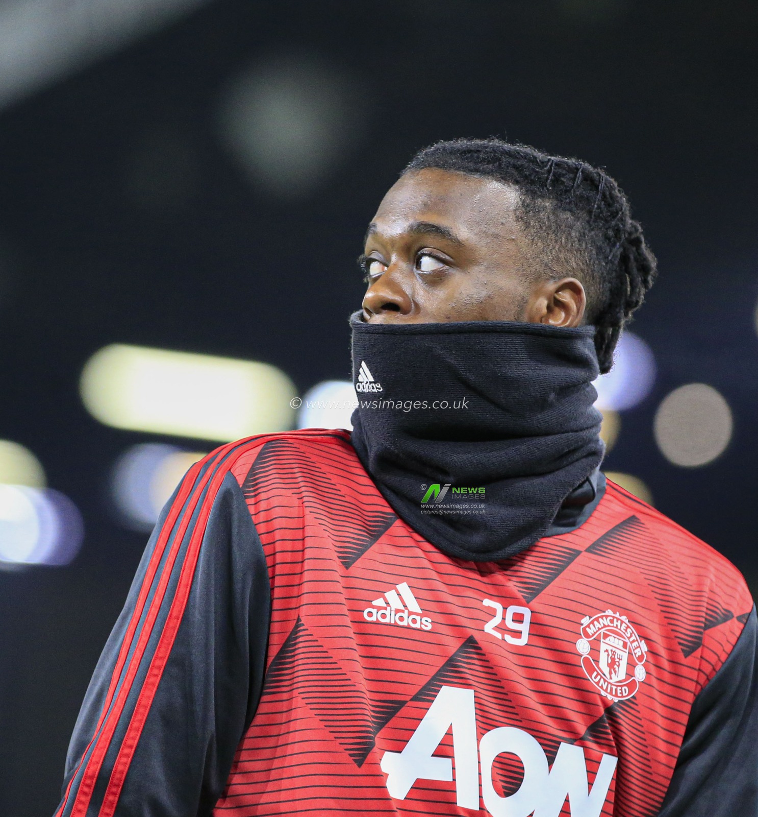 28th December 2019, Turf Moor, Burnley, England; Premier League, Burnley v Manchester United : Aaron Wan-Bissaka (29) of Manchester United warms up for the game

Credit: Conor Molloy/News Images
