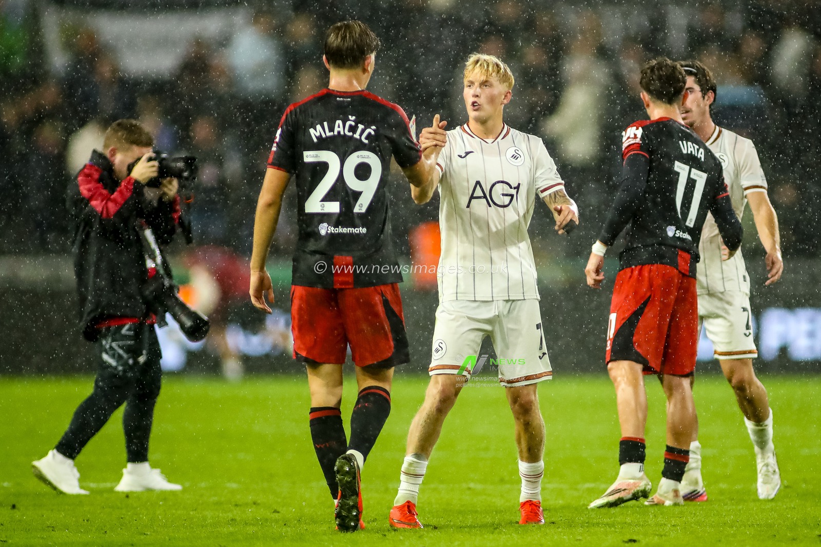 Melker Widell of Swansea City shakes hands with Branimir Miacic of Watford at the final whistle during the Sky Bet Championship match Swansea City vs Watford at Swansea.com Stadium, Swansea, United Kingdom on 01 September 2026

(Photo by Andrew Lewis/News Images)