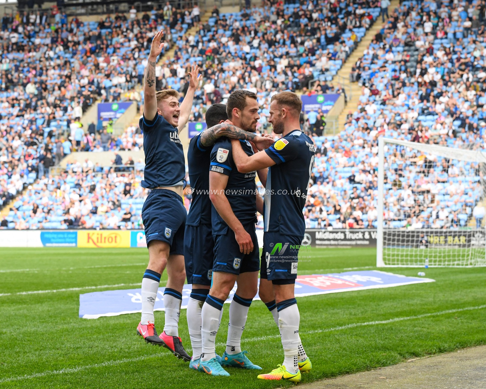 Harry Toffolo #3 of Huddersfield Town celebrates scoring a goal to make it 0-1