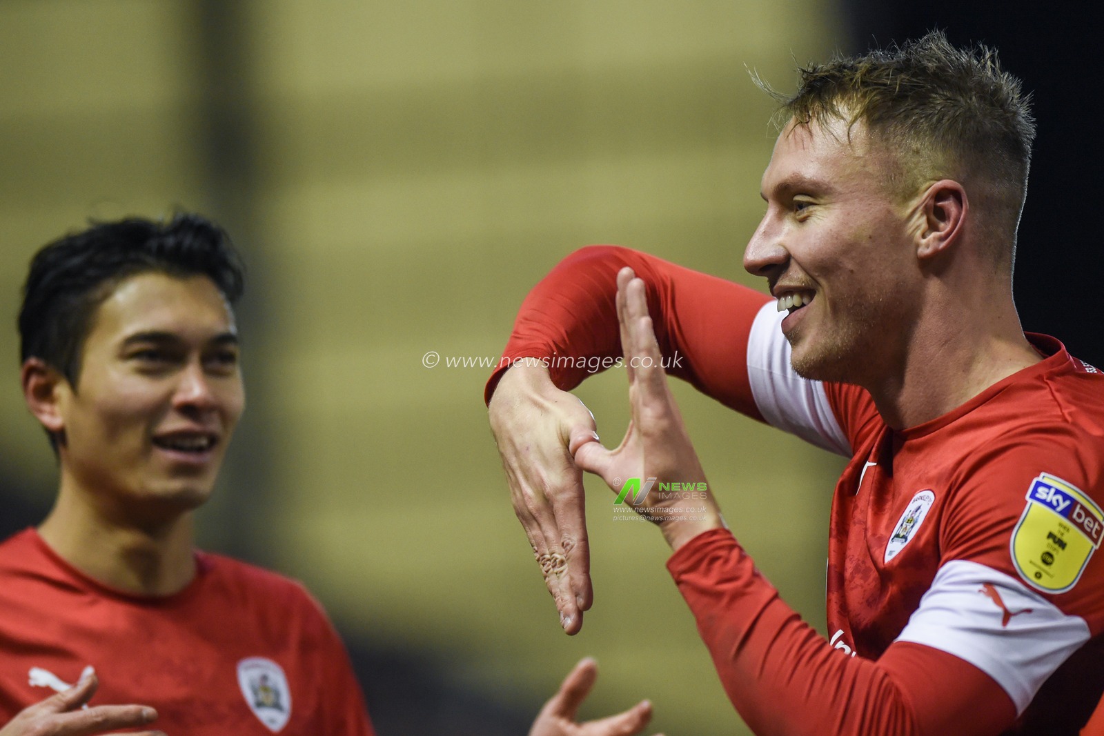 11th December 2019, Oakwell, Barnsley, England; Sky Bet Championship, Barnsley v Reading : Goalscorer Cauley Woodrow (9) of Barnsley FC  celebrates his goal to make it 1-0.

Credit: Dean Williams/News Images