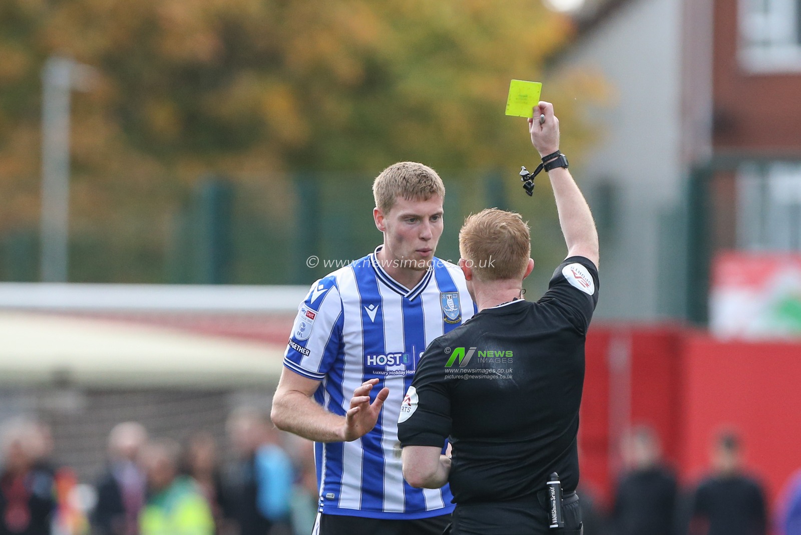 Mark McGuinness #34 of Sheffield Wednesday is shown a yellow card during the Sky Bet League 1 match Lincoln City vs Sheffield Wednesday at Gelder Group Sincil Bank Stadium, Lincoln, United Kingdom, 22nd October 2022

(Photo by Arron Gent/News Images)