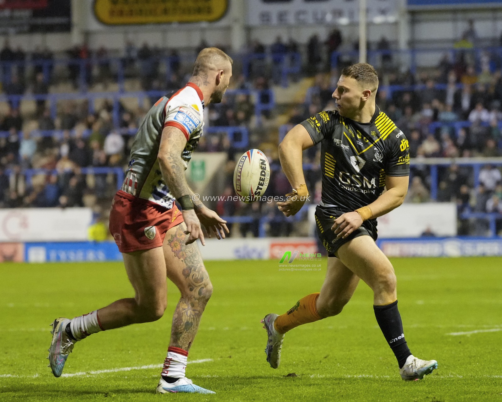 George Williams #6 of Warrington Wolves flicks the ball backward during the Rugby League Ben Currie Testimonial match Warrington Wolves vs Leigh Leopards at Halliwell Jones Stadium, Warrington, United Kingdom, 4th February 2023

(Photo by Steve Flynn/News Images)