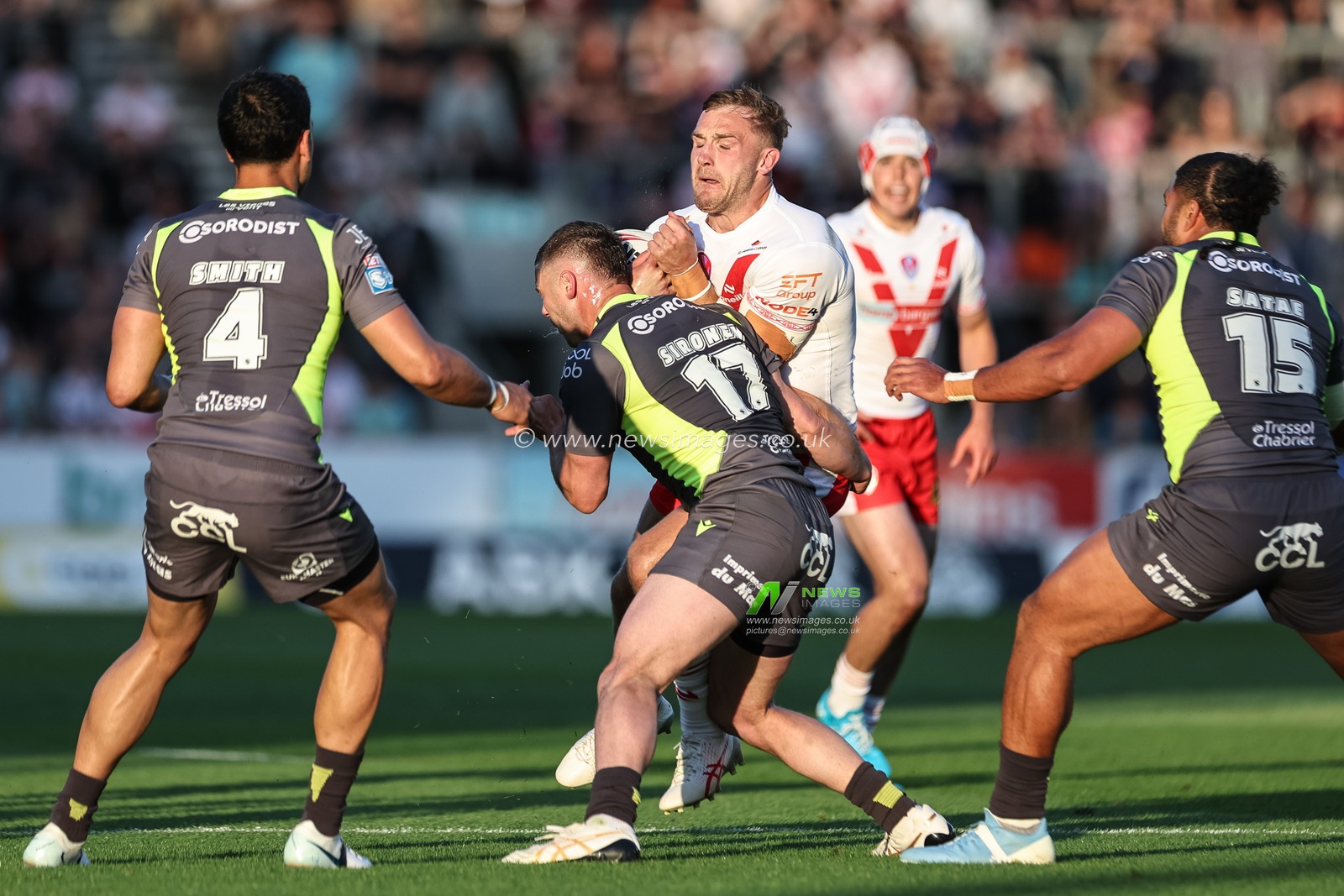 Matty Lees of St. Helens is tackled by Bayley Sironen of Catalan Dragons during the Betfred Super League Round 11 match St Helens vs Catalans Dragons at Totally Wicked Stadium, St Helens, United Kingdom, 15th May 2025

(Photo by Mark Cosgrove/News Images)