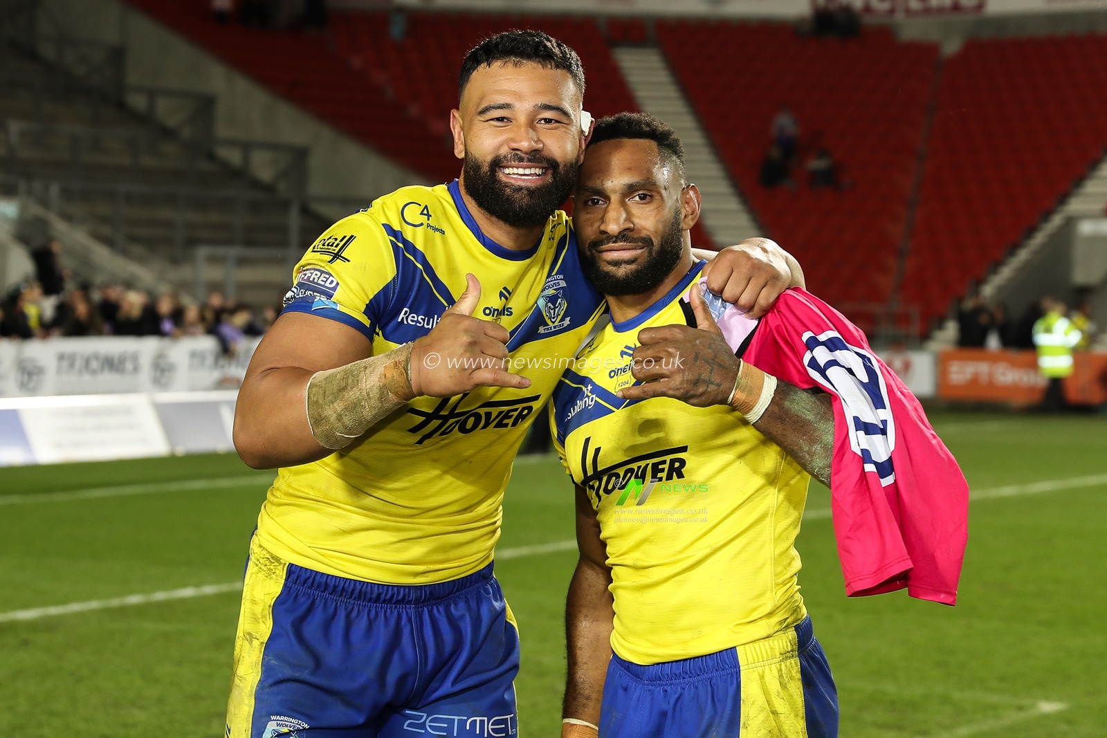 Zane Musgrove of Warrington Wolves and Rodrick Tai of Warrington Wolves celebrate their teams win after the Betfred Super League Round 5 match St Helens vs Warrington Wolves at Totally Wicked Stadium, St Helens, United Kingdom, 21st March 2025

(Photo by Gareth Evans/News Images)