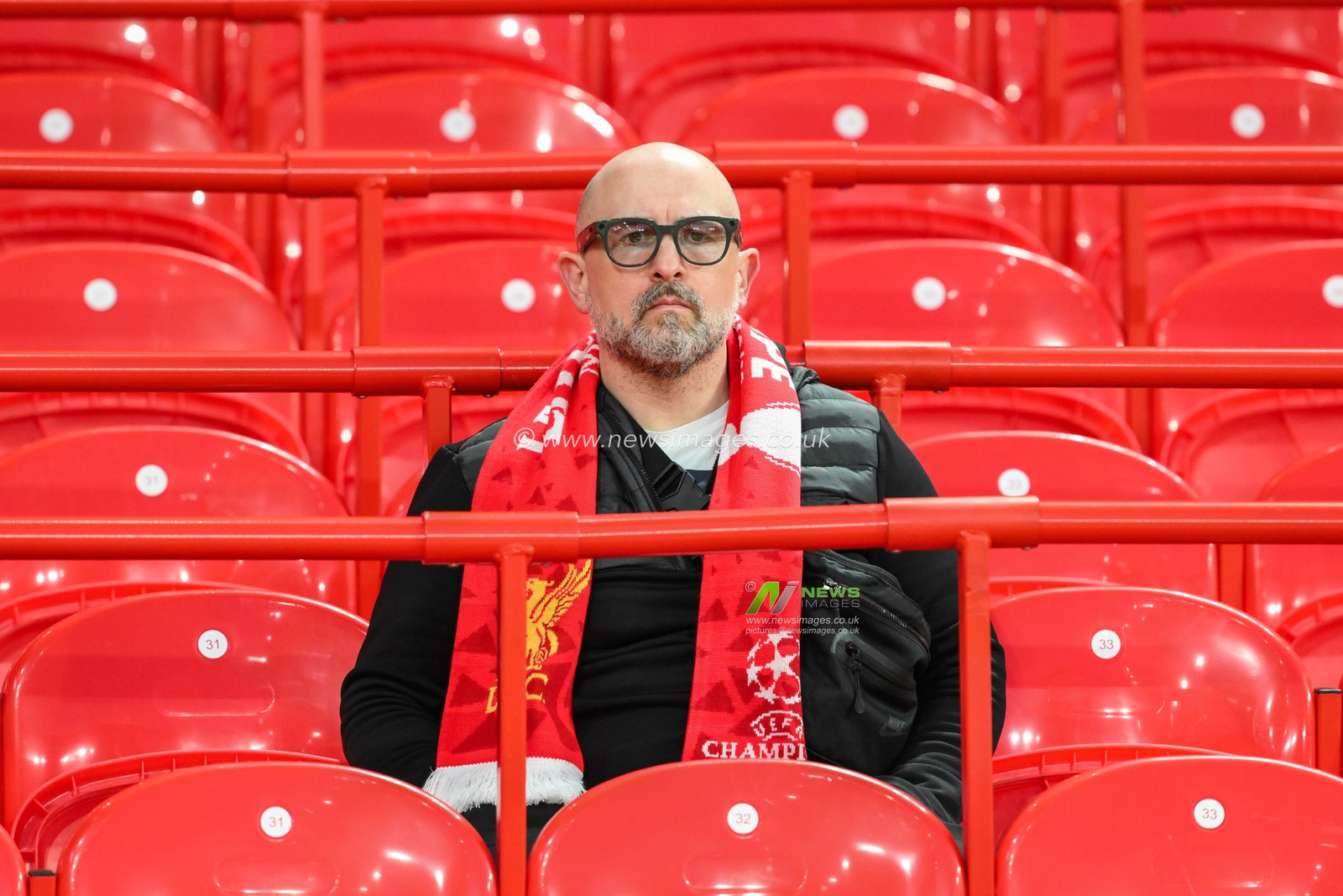 A Liverpool fan arrive at Anfield prior to the UEFA Champions League  - League Stage match Liverpool vs Bologna at Anfield, Liverpool, United Kingdom, 2nd October 2024

(Photo by Craig Thomas/News Images)