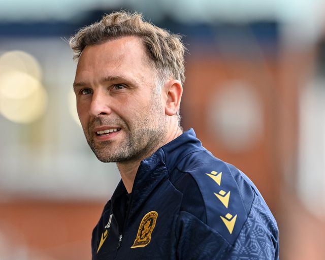 John Eustace manager of Blackburn Rovers walks towards the bench ahead of kick off during the Pre-season friendly match Stockport County vs Blackburn Rovers at Edgeley Park Stadium, Stockport, United Kingdom, 2nd August 2024

(Photo by Cody Froggatt/News Images)