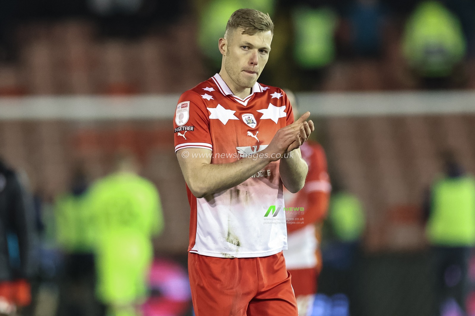 Sam Cosgrove of Barnsley applauds the home fans during the Sky Bet League 1 match Barnsley vs Bolton Wanderers at Oakwell, Barnsley, United Kingdom, 5th March 2024

(Photo by Mark Cosgrove/News Images)