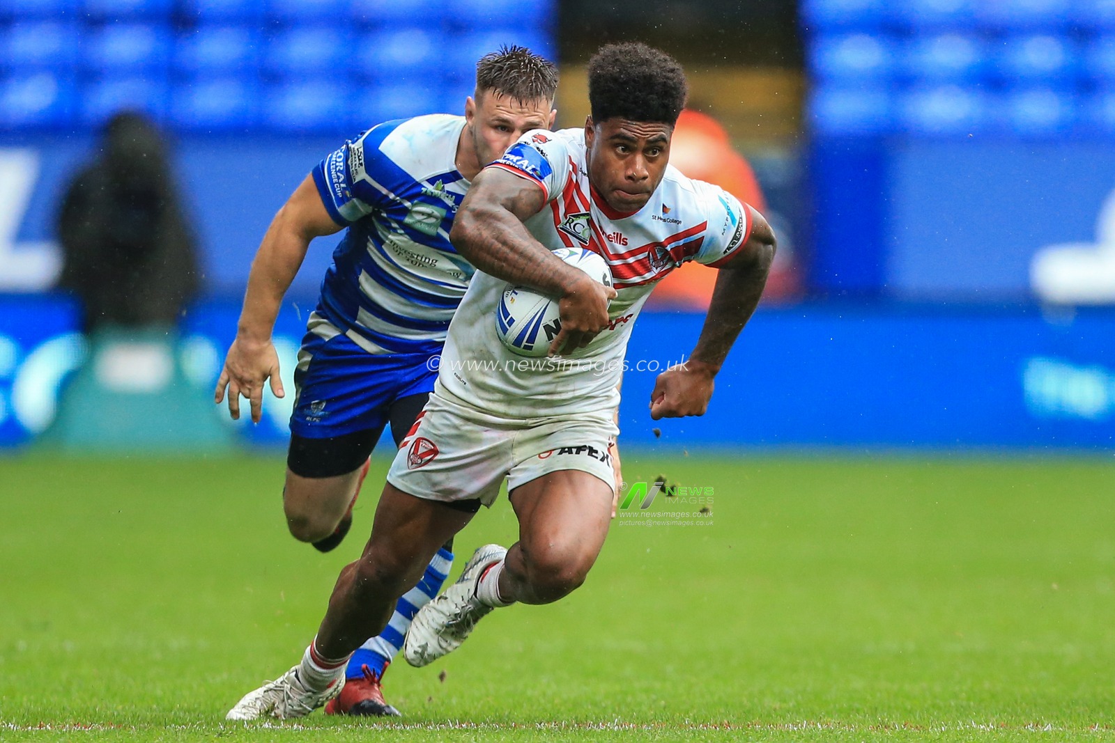 27th July 2019 , University of Bolton Stadium, Bolton, England; 2019 Coral Challenge Cup Semi-Final, St Helens vs Halifax RLFC ; Kevin Naiqama (3) of St Helens makes a break 


Credit: Mark Cosgrove/News Images
