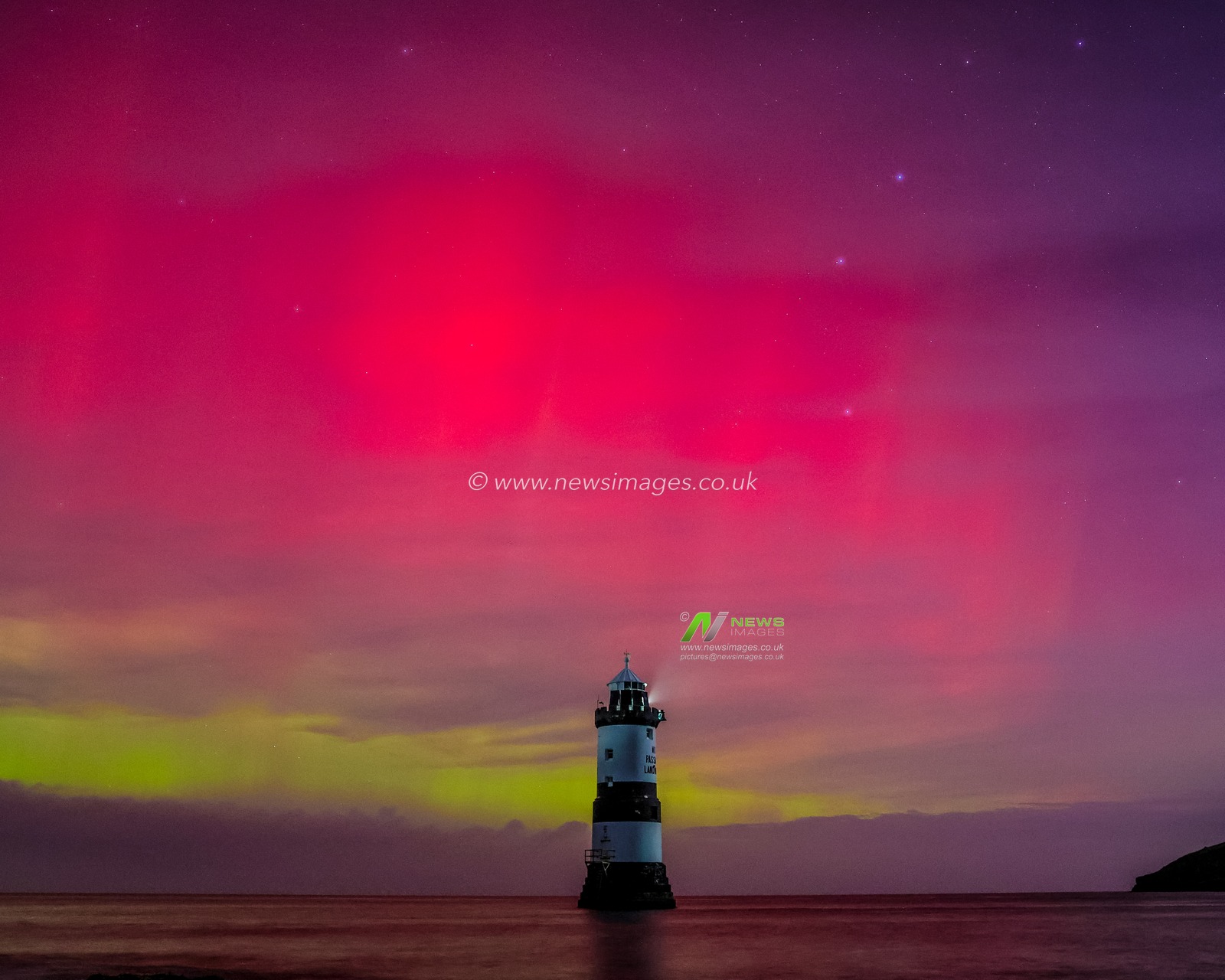 Northern Lights also know as the Aurora Borealis shine and dance over Penmon Lighthouse, Penmon, on Anglesey, United Kingdom, 12th November 2025

(Photo by Mark Cosgrove/News Images)

*** GER AUT SUI OUT ***