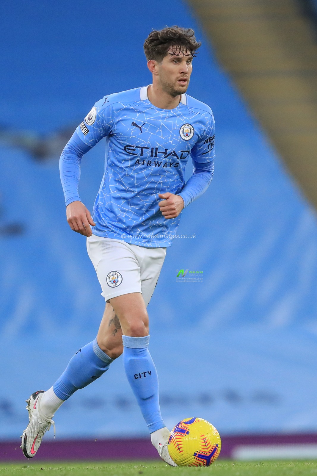 John Stones #5 of Manchester City in action during the game