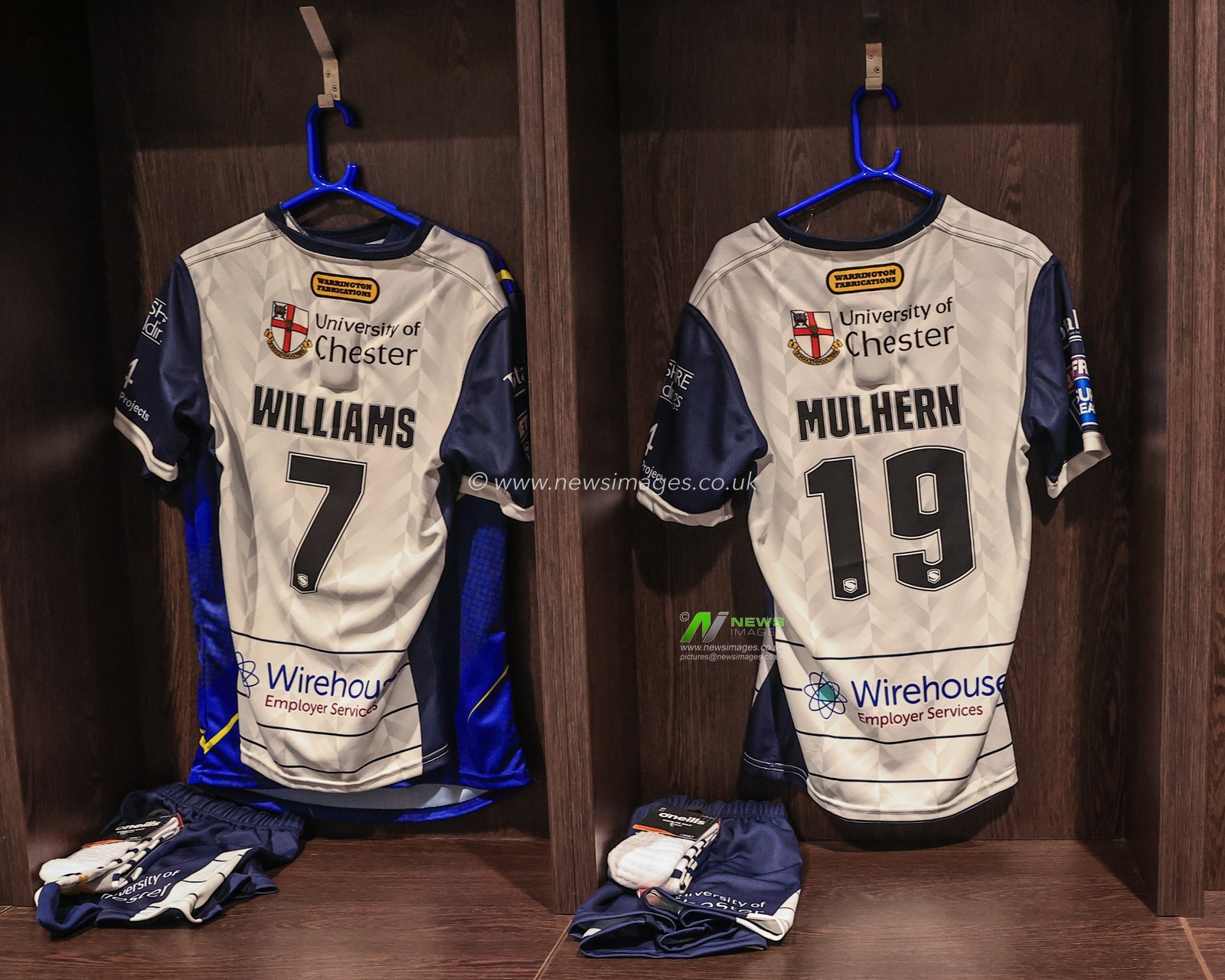 Warrington Dressing room game shirts of George Williams #7 of Warrington Wolves and Rob Mulhern #19 of Warrington Wolves