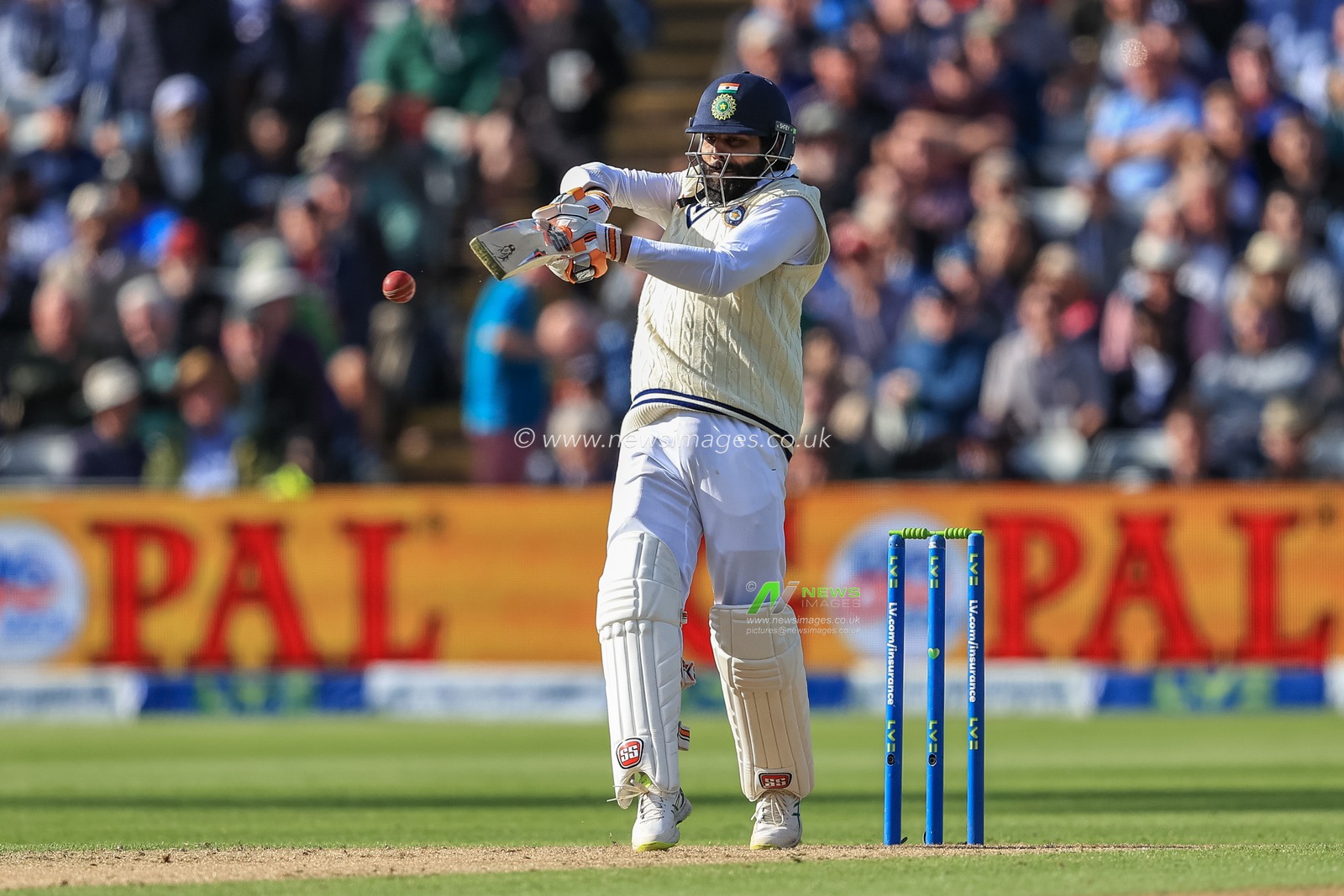 Ravindra Jadeja of India hits a four (4)