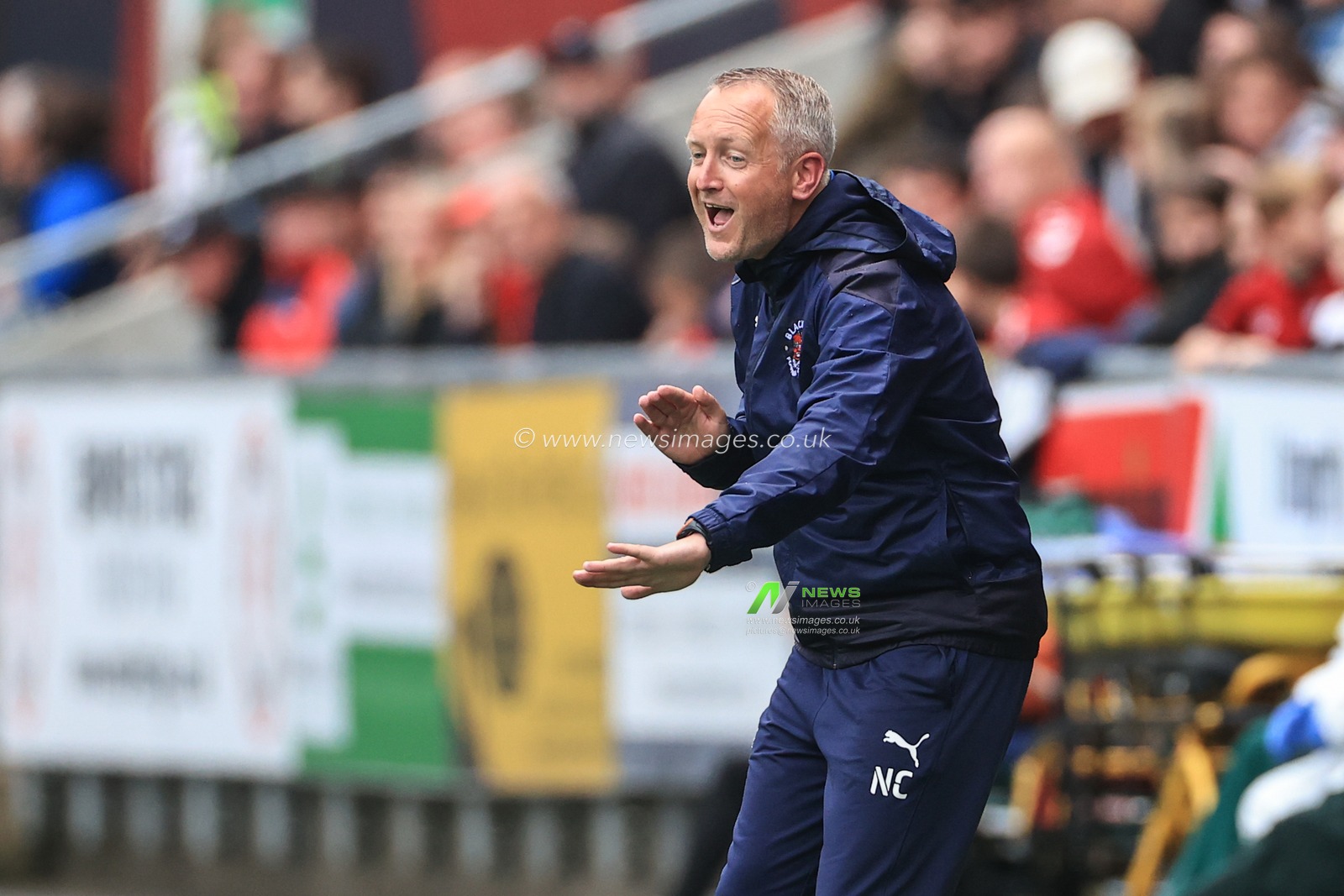 Neil Critchley Manager of Blackpool gives his team instructions