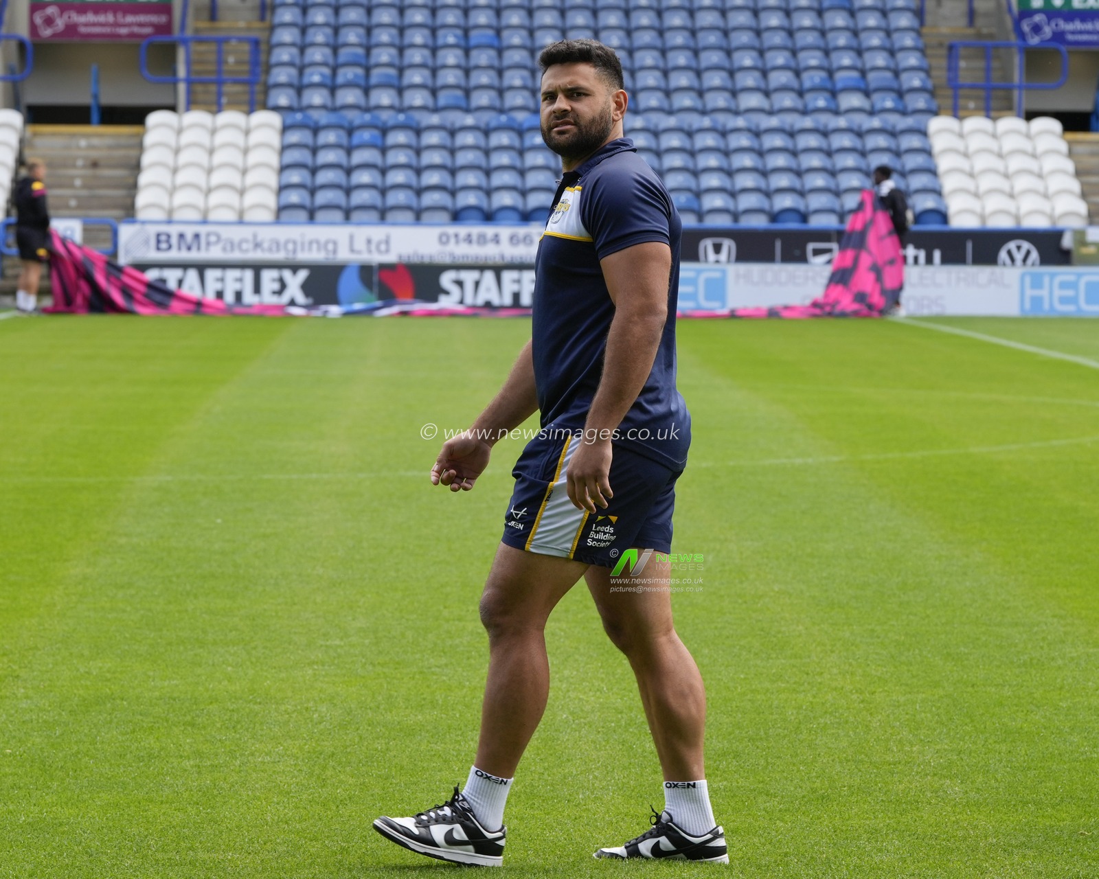 Rhyse Martin #12 of Leeds Rhinos inspects the pitch before the Betfred Super League Round 23 match Huddersfield Giants vs Leeds Rhinos at John Smith's Stadium, Huddersfield, United Kingdom, 27th August 2023

(Photo by Steve Flynn/News Images)