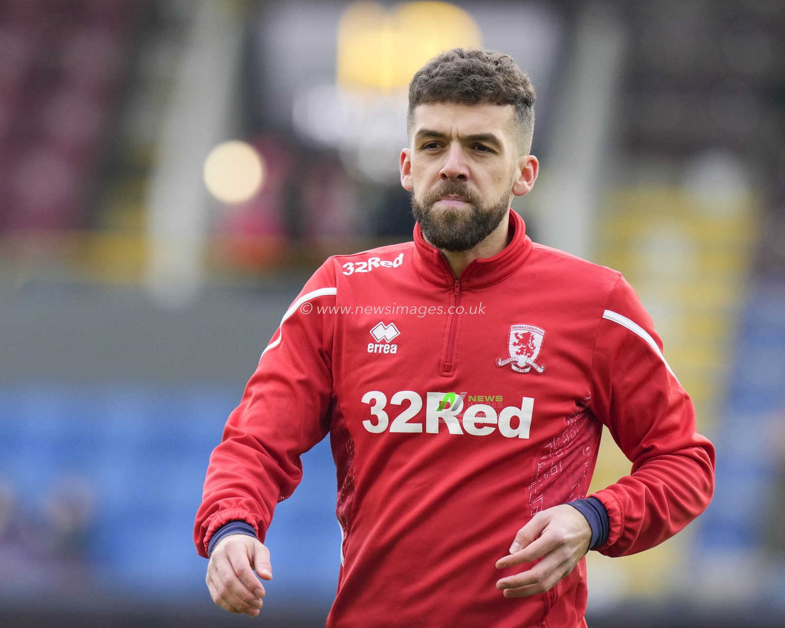Tommy Smith #14 of Middlesbrough warms up before  the Sky Bet Championship match Burnley vs Middlesbrough at Turf Moor, Burnley, United Kingdom, 17th December 2022

(Photo by Steve Flynn/News Images)