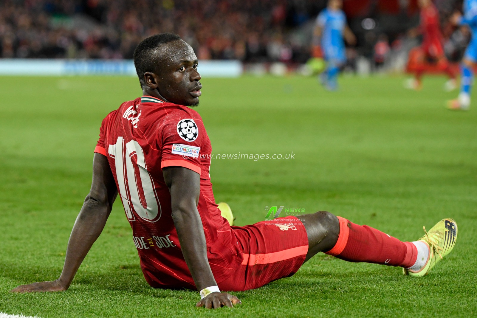 Sadio Mane #10 of Liverpool sits on the pitch