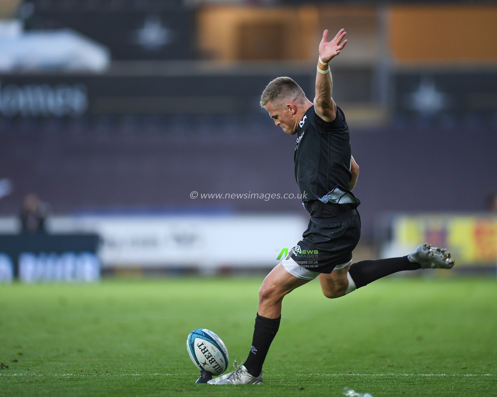 Gareth Anscombe of Ospreys Rugby, converts Jac Morgan of Ospreys Rugby, try. to make it 10-12