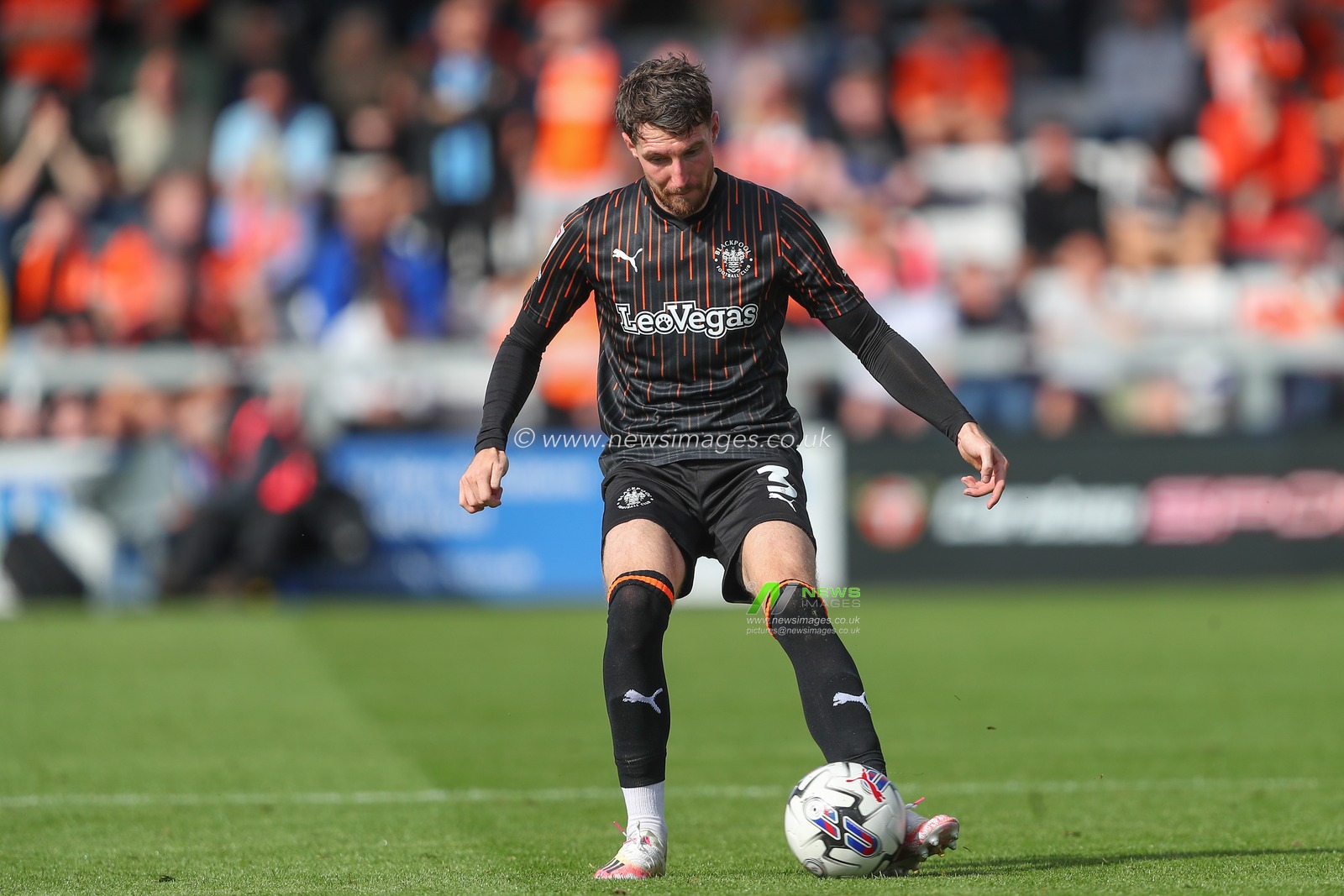 James Husband #3 of Blackpool passes the ball during the Sky Bet League 1 match Lincoln City vs Blackpool at Gelder Group Sincil Bank Stadium, Lincoln, United Kingdom, 26th August 2023

(Photo by Gareth Evans/News Images)