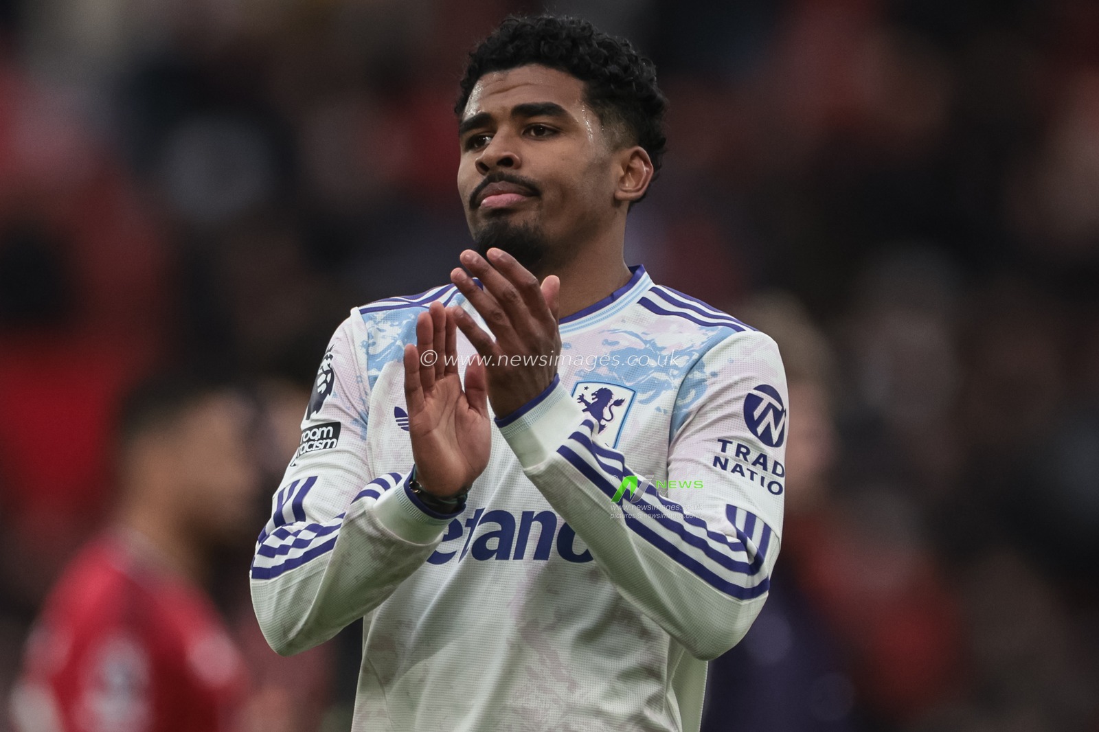 Ian Maatsen of Aston Villa applauds the fans after the final whistle during the Premier League match Manchester United vs Aston Villa at Old Trafford, Manchester, United Kingdom on 15 March 2026

(Photo by Mark Cosgrove/News Images)