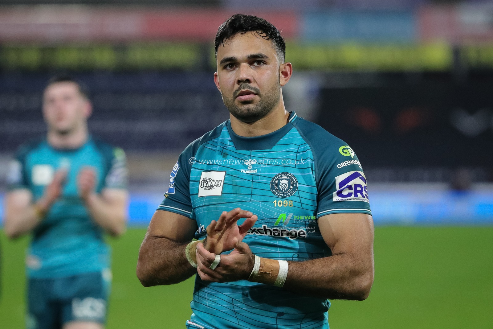 Bevan French #2 of Wigan Warriors claps his hands and applauds the supporters at full-time after the Betfred Super League Round 5 match Huddersfield Giants vs Wigan Warriors at John Smith's Stadium, Huddersfield, United Kingdom, 17th March 2023

(Photo by James Heaton/News Images)