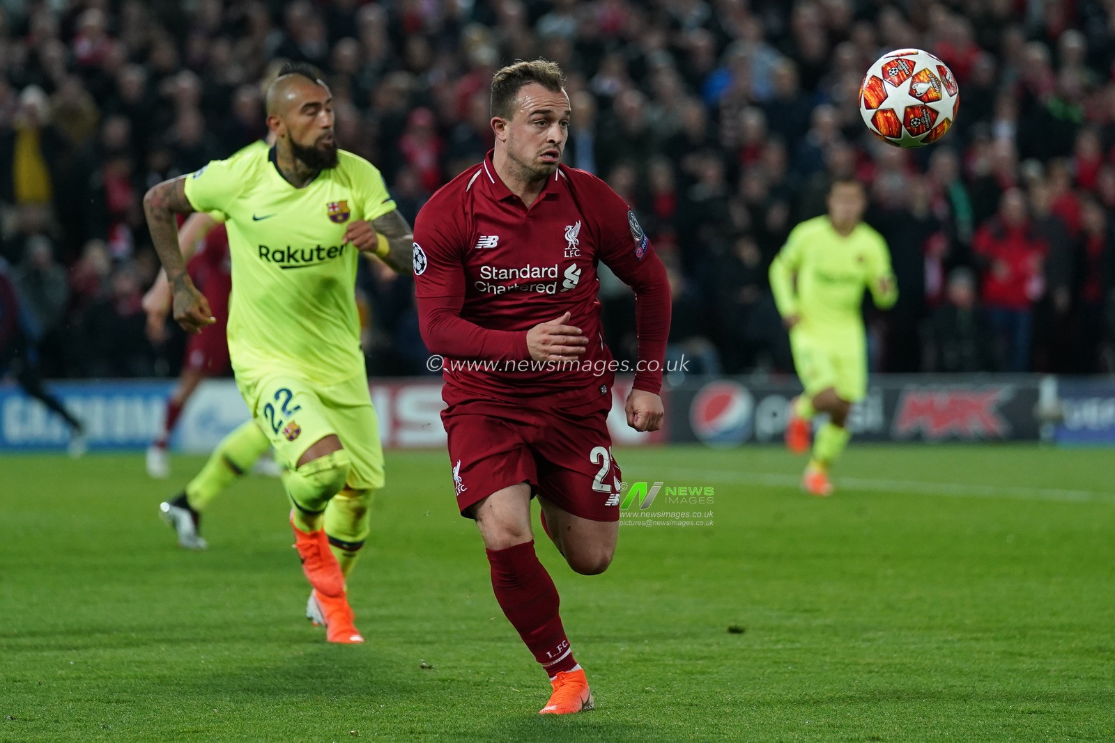 Liverpool's Xherdan Shaqiri under pressure from Barcelona's Arturo Vidal

7th Mayl 2019 , Anfield Stadium, Liverpool, England;  UEFA Champions League Semi Final, Second Leg, Liverpool FC vs FC Barcelona 

Credit: Terry Donnelly/News Images