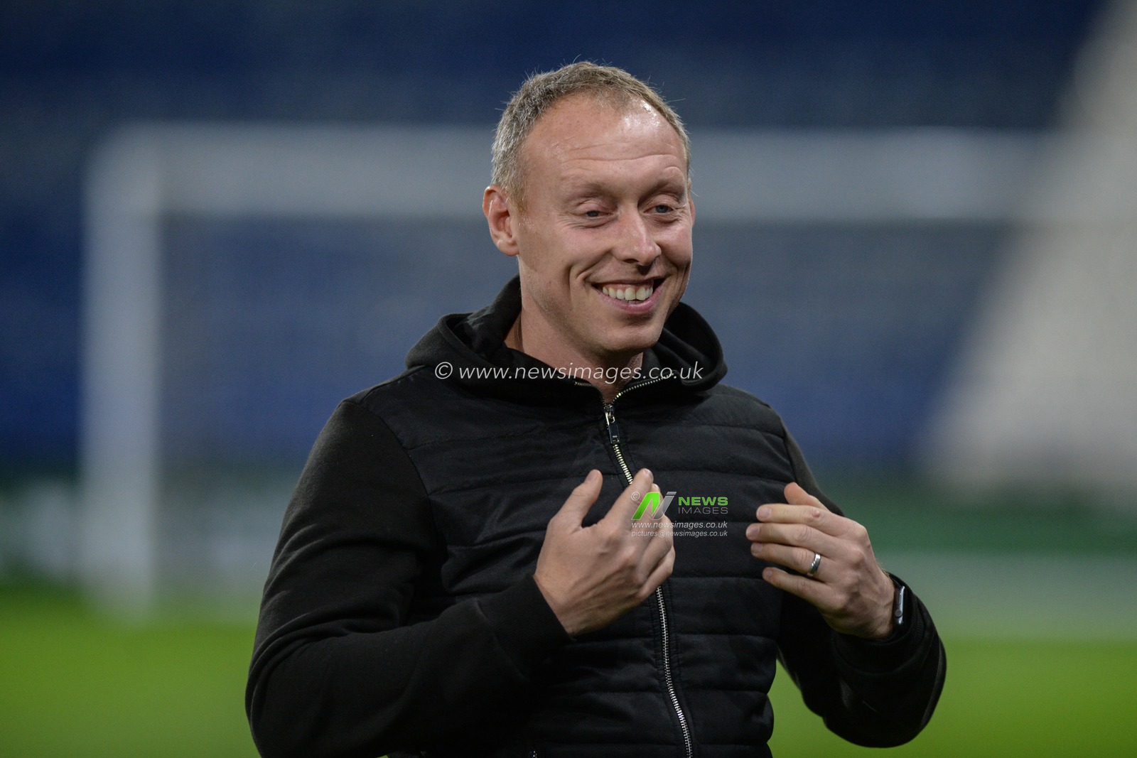 26th November 2019, John Smith's Stadium, Huddersfield, England; Sky Bet Championship, Huddersfield Town v Swansea City : Steve Cooper Manager of Swansea City all smiles prior to the Championship game against Huddersfield Town.

Credit: Dean Williams/News Images