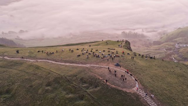 Sunrise hikers walk to the summit of Mam Tor as they watch the sunrise and admire the cloud inversion in the Hope Valley at Mam Tor in the Peak District at Mam Tor, Castleton, United Kingdom on 21 March 2026

(Photo by Mark Cosgrove/News Images)