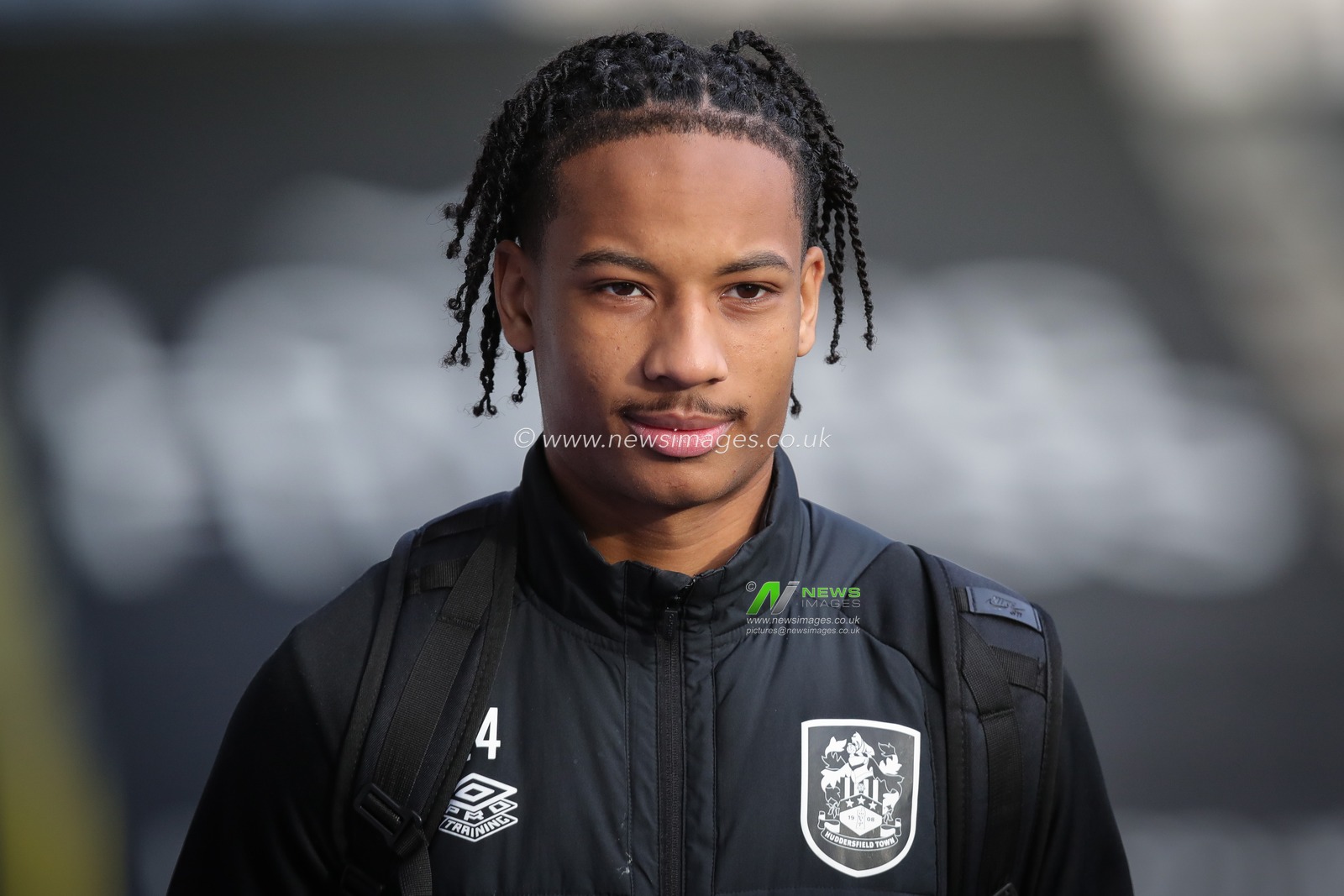 Etienne Camara #24 of Huddersfield Town arrives at The John Smith's Stadium ahead of the Sky Bet Championship match Huddersfield Town vs Luton Town at John Smith's Stadium, Huddersfield, United Kingdom, 1st January 2023

(Photo by James Heaton/News Images)