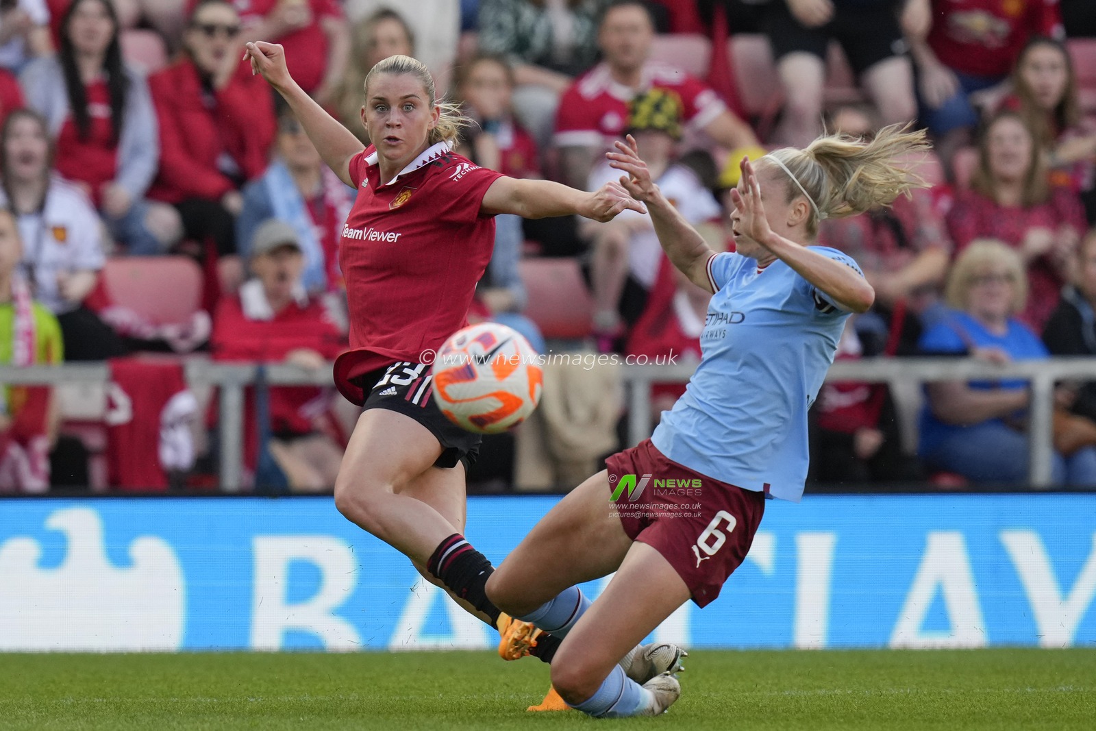 Alessia Russo #23 of Manchester United crosses the ball under pressure from Steph Houghton #6 of Manchester City during the The FA Women's Super League match Manchester United Women vs Manchester City Women at Leigh Sports Village, Leigh, United Kingdom, 21st May 2023

(Photo by Steve Flynn/News Images)