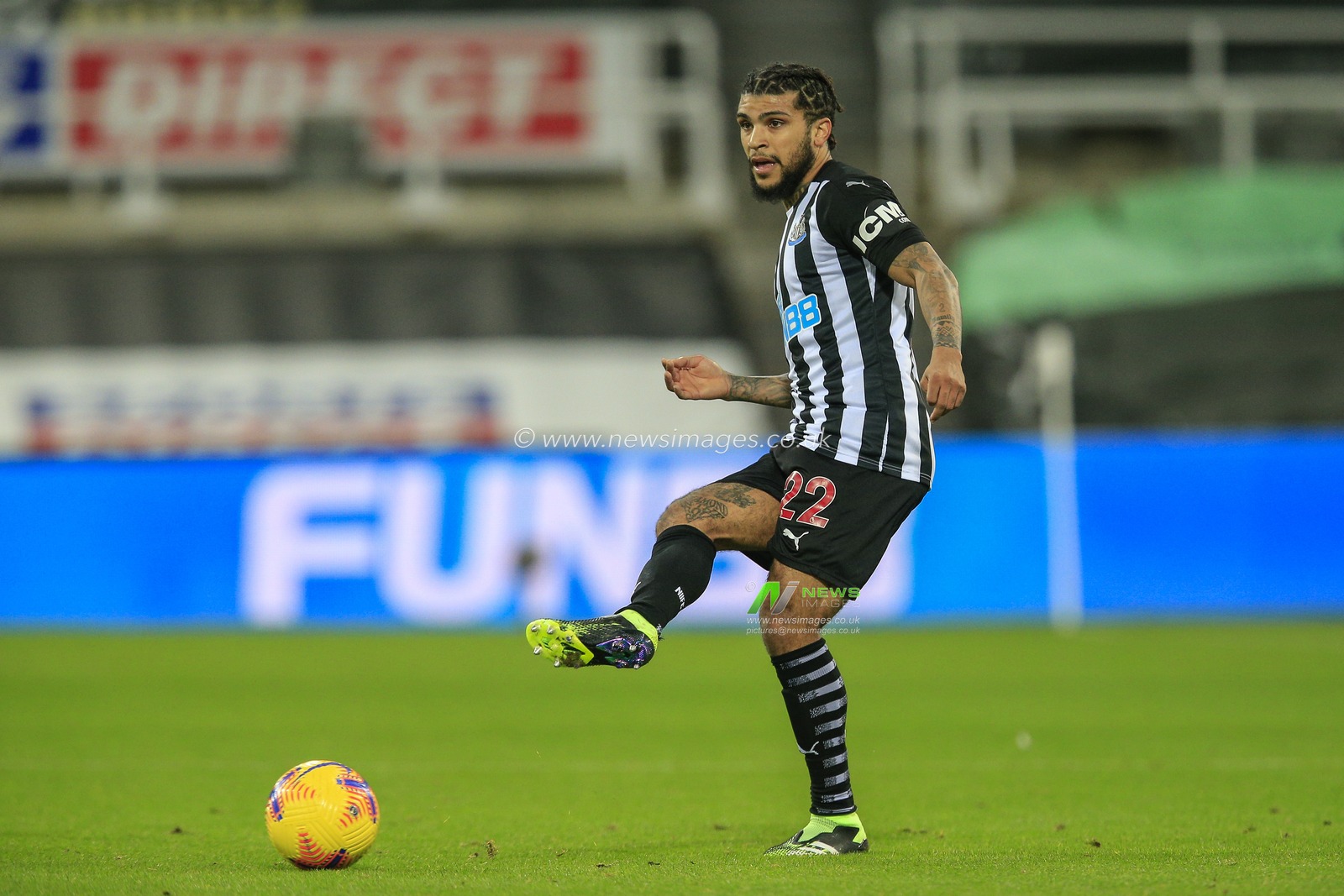 DeAndre Yedlin #22 of Newcastle United with the ball
