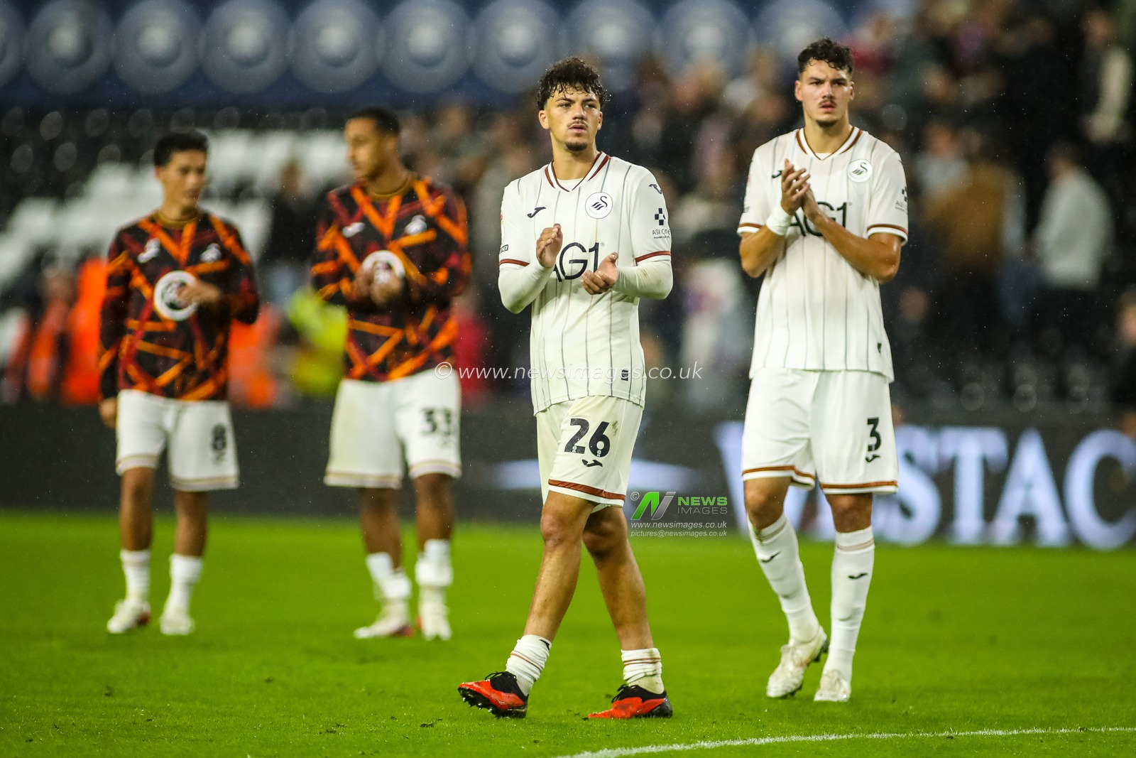 Filip Lissah and Jenson Seelt of Swansea City applaud the fans during the Sky Bet Championship match Swansea City vs Watford at Swansea.com Stadium, Swansea, United Kingdom on 01 September 2026

(Photo by Andrew Lewis/News Images)