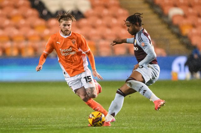 Hayden Coulson of Blackpool and Triston Rowe of Aston Villa battle for the ball during the The Vertu Trophy match Blackpool vs Aston Villa U21 at Bloomfield Road, Blackpool, United Kingdom, 17th December 2024

(Photo by Craig Thomas/News Images)