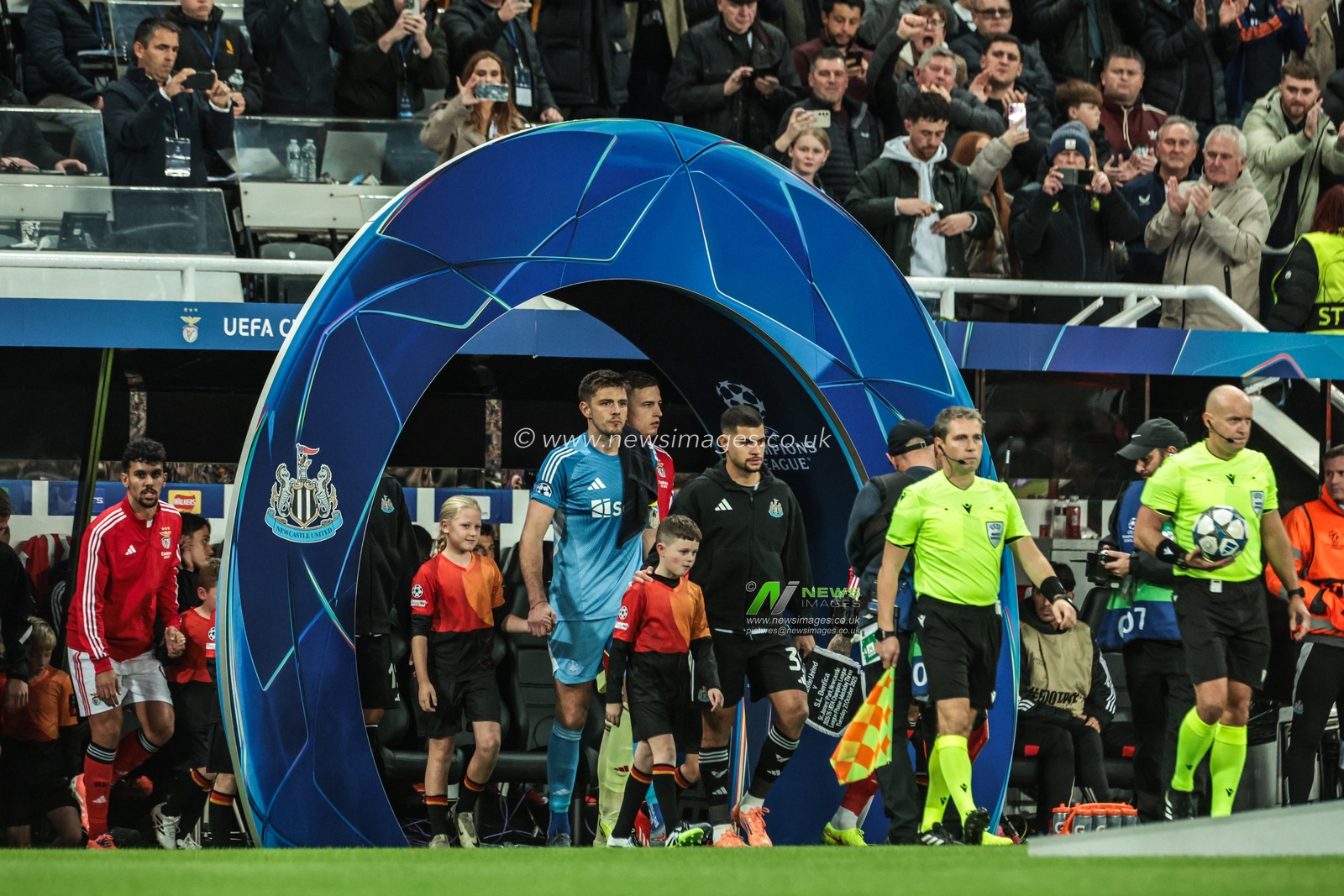 Referee Szymon Marciniak leads out the teams for the game during the UEFA Champions League Matchday 3 of 8 Newcastle United vs Benfica at St. James's Park, Newcastle, United Kingdom, 21st October 2025

(Photo by Mark Cosgrove/News Images)