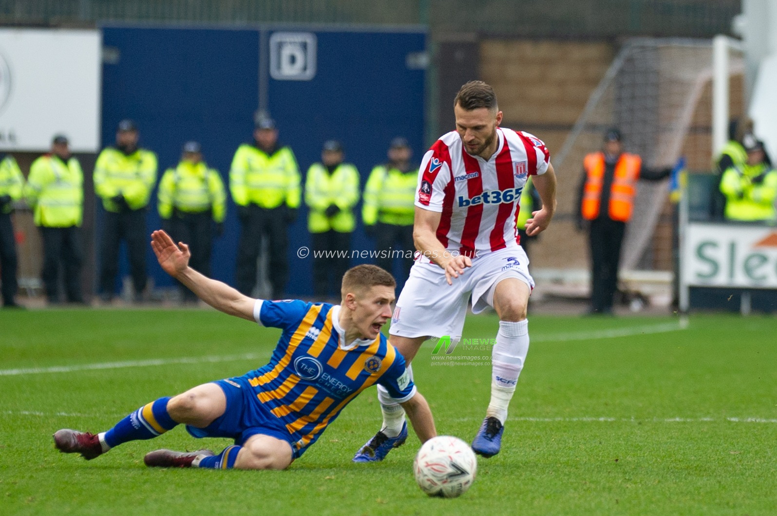 5th January 2019, New Meadow, Shrewsbury, England ; The Emirates FA Cup, 3rd Round, Shrewsbury Town vs Stoke City : Greg Docherty (8) of Shrewsbury Town appeals the foul but gets nothing

Credit: Richard Long/News Images

English Football League images are subject to DataCo Licence
