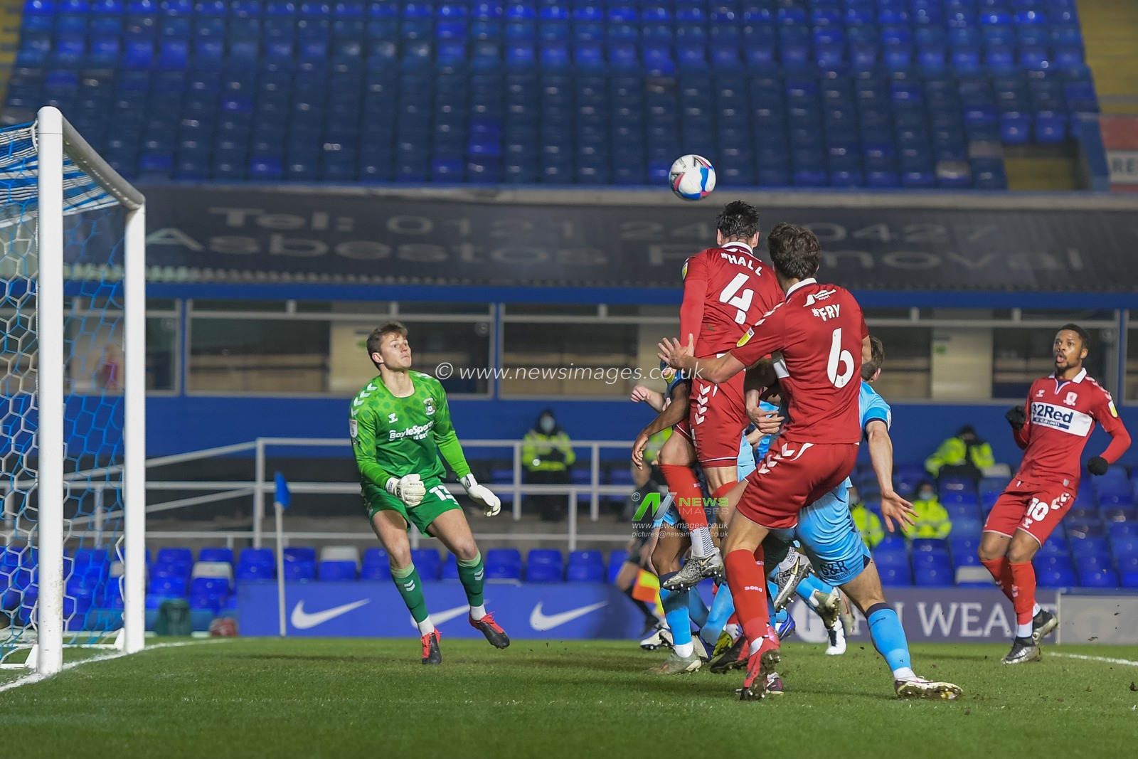 Grant Hall #4 of Middlesbrough heads the ball into the Coventry net to make it 1-1