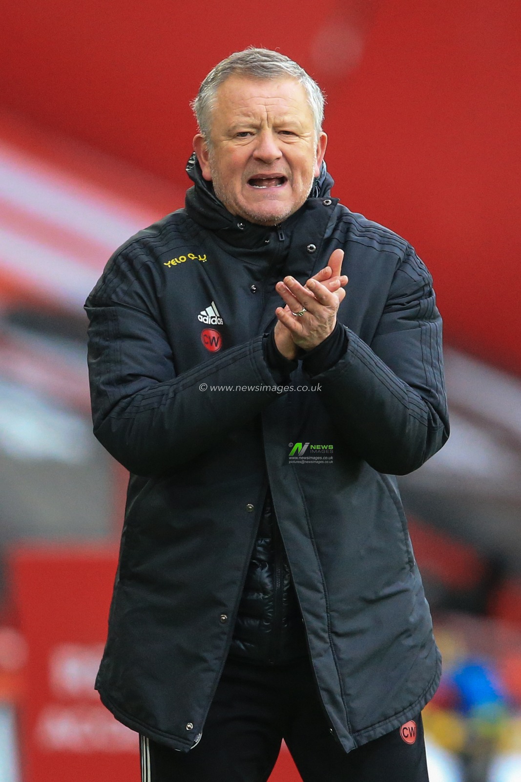 Chris Wilder manager of Sheffield United rubs his hand together during the game