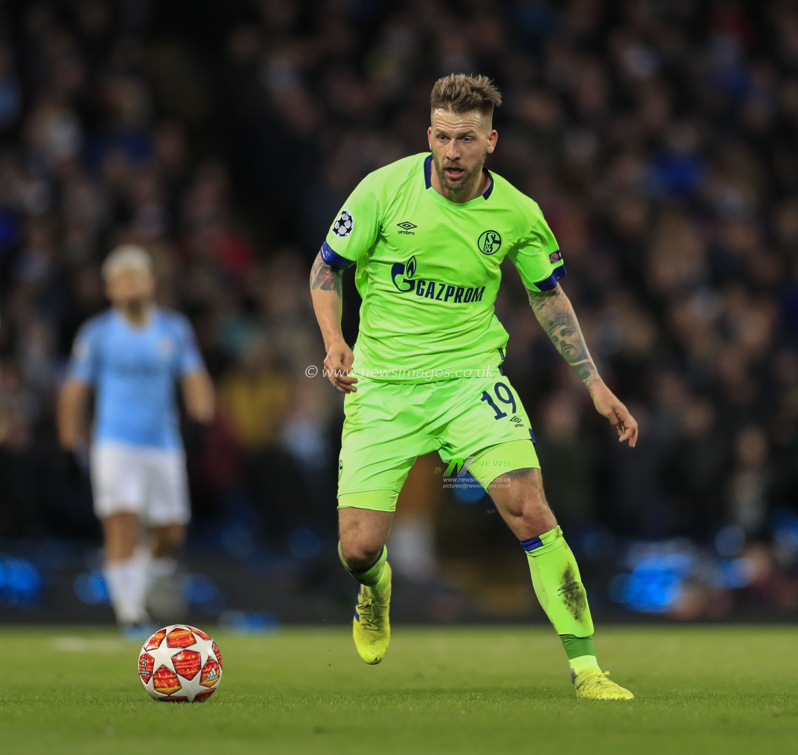12th March 2019 , Etihad Stadium, Manchester, England; UEFA Champions League, Round of 16, Manchester City v Schalke ; Guido Burgstaller (19) of FC Schalke runs with the ball

Credit: Conor Molloy/News Images
