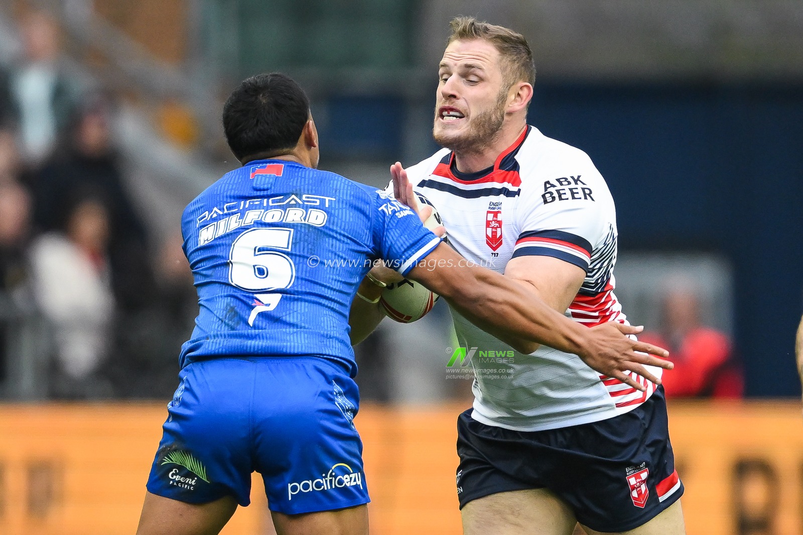 Tom Burgess of England is tackled by Anthony Milford of Samoa during the ABK Beer Internationals Series match England vs Samoa at The Brick Community Stadium, Wigan, United Kingdom, 27th October 2024

(Photo by Craig Thomas/News Images)