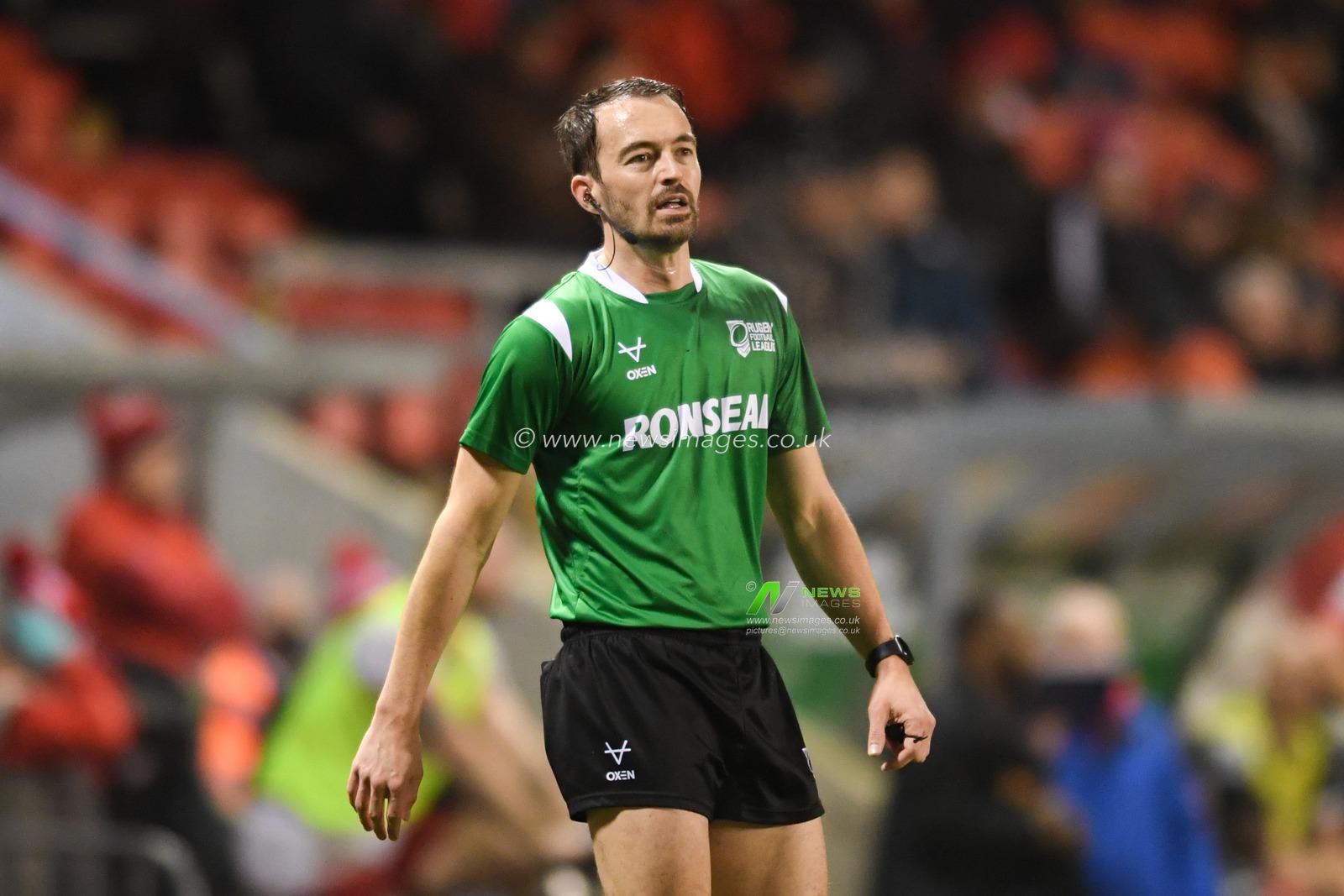 Referee James Child in action during the game
