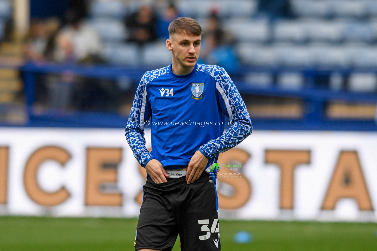 Ciaran Brennan #34 of Sheffield Wednesday warming up before the game