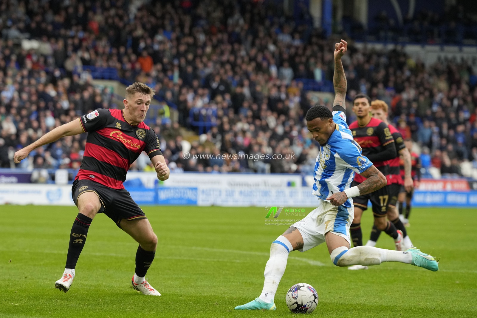 Delano Burgzorg #7 of Huddersfield Town sets to shoot at goal during the Sky Bet Championship match Huddersfield Town vs Queens Park Rangers at John Smith's Stadium, Huddersfield, United Kingdom, 21st October 2023

(Photo by Steve Flynn/News Images)