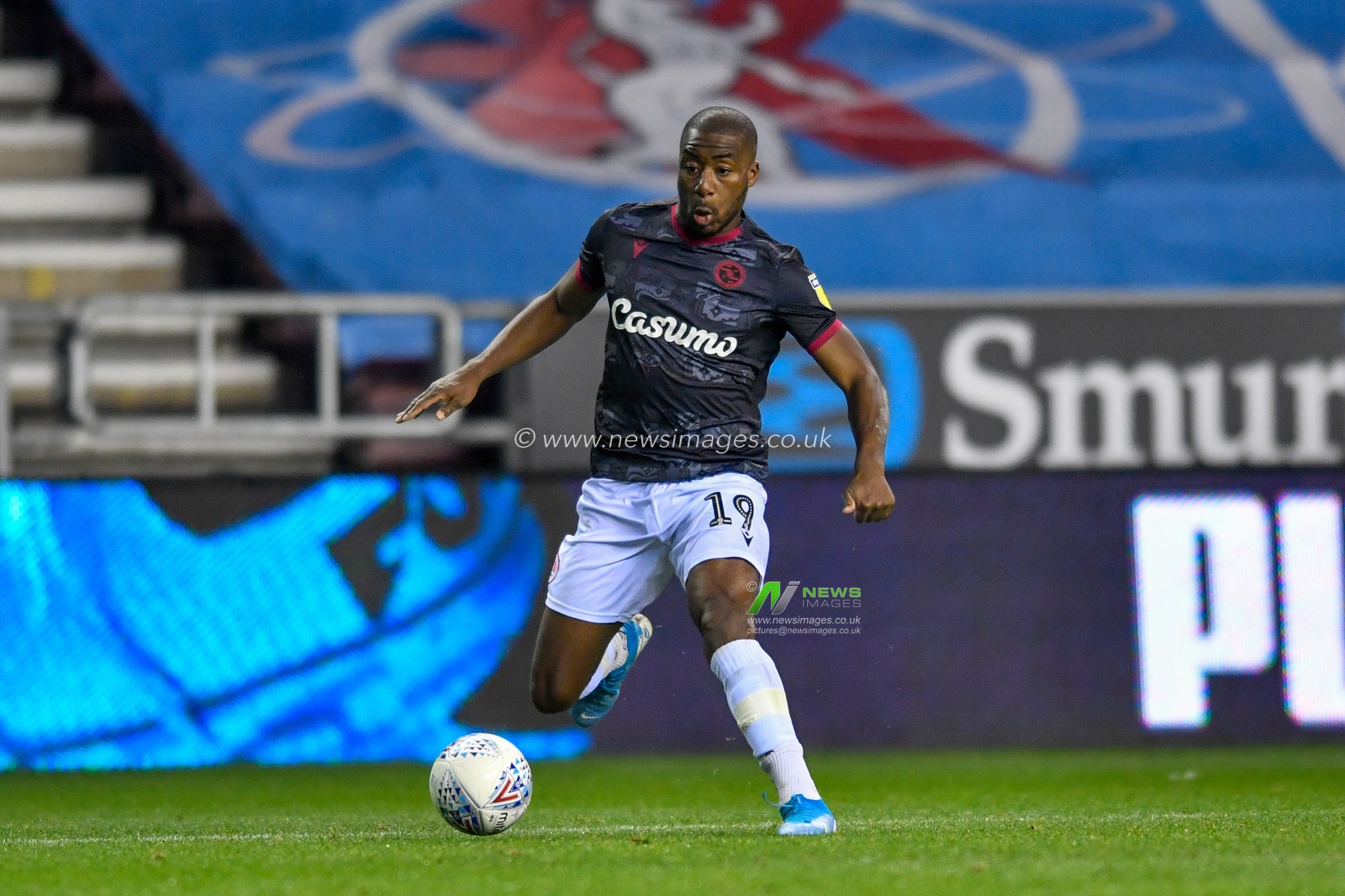 30th November 2019, DW Stadium, Wigan, England; Sky Bet Championship, Wigan Athletic v Reading : Yakou Meite (19) of Reading with the ball at his feet

Credit: Simon Whitehead/News Images
