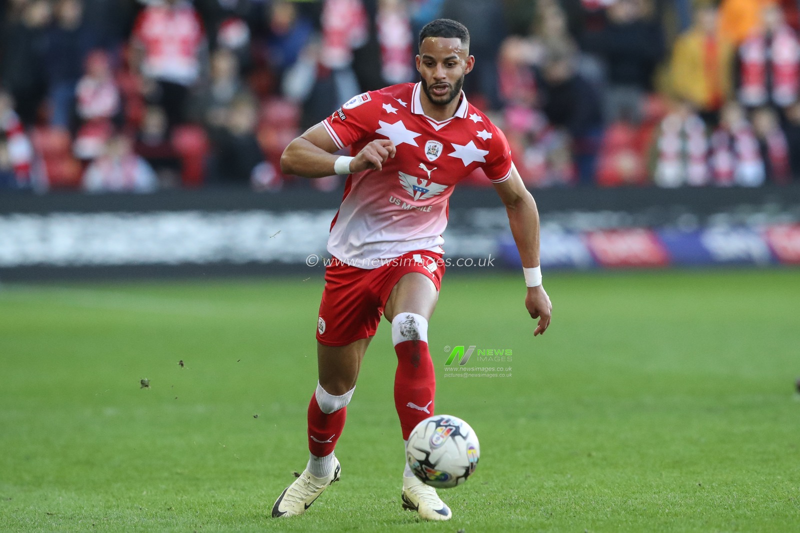 Barry Cotter of Barnsley breaks with the ball during the Sky Bet League 1 match Barnsley vs Derby County at Oakwell, Barnsley, United Kingdom, 24th February 2024

(Photo by Alfie Cosgrove/News Images)