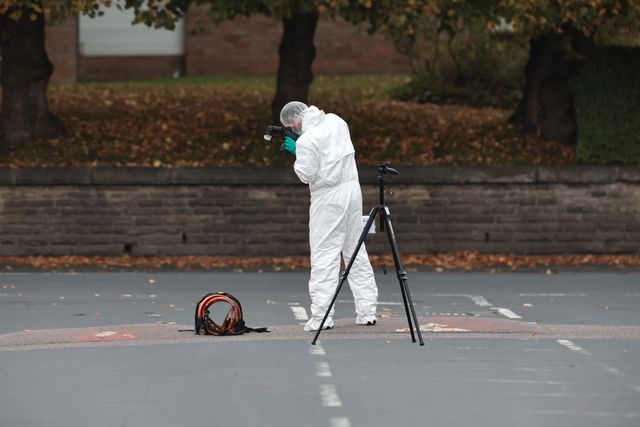 A forensic police officer analyses crime scenes, gathers and preserves evidence as they take photographs of the scene during the Manchester synagogue attack at Manchester Synagogue, Manchester, United Kingdom, 2nd October 2025

(Photo by Mark Cosgrove/News Images)