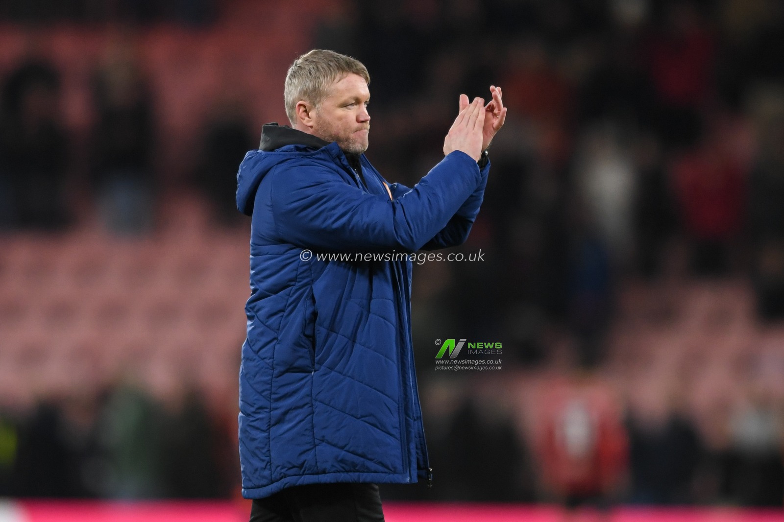 Grant McCann manager of Hull City applauds the travelling supporters at the end of the game after his side beat Bournemouth 0-1 at the Vitality Stadium