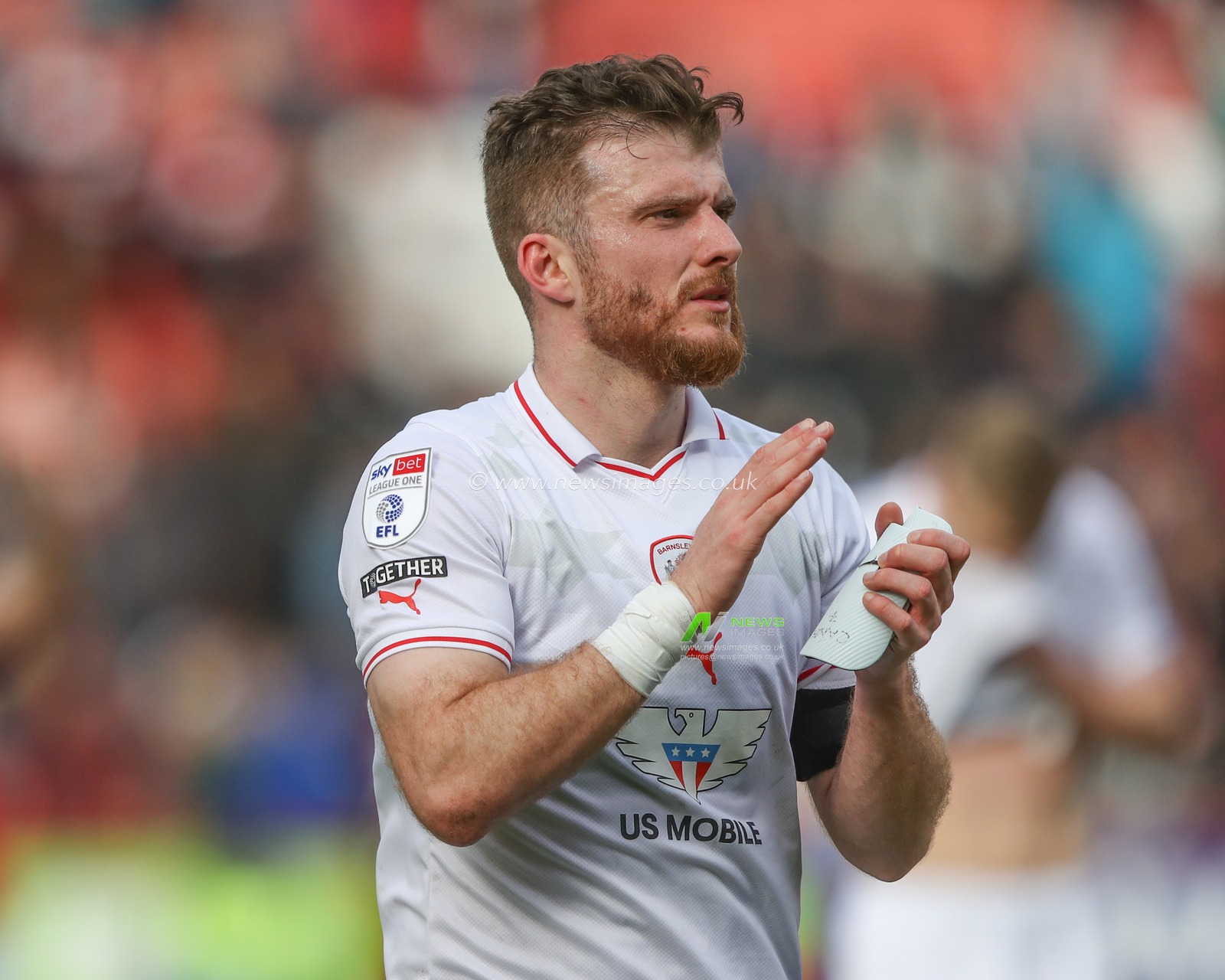 Nicky Cadden of Barnsley applauds the travelling fans after the game during the Sky Bet League 1 match Charlton Athletic vs Barnsley at The Valley, London, United Kingdom, 6th April 2024

(Photo by Alfie Cosgrove/News Images)